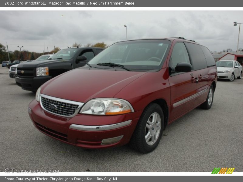 Matador Red Metallic / Medium Parchment Beige 2002 Ford Windstar SE
