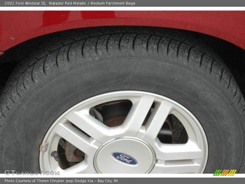 Matador Red Metallic / Medium Parchment Beige 2002 Ford Windstar SE