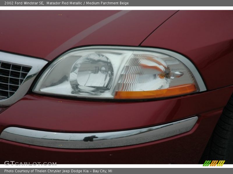Matador Red Metallic / Medium Parchment Beige 2002 Ford Windstar SE