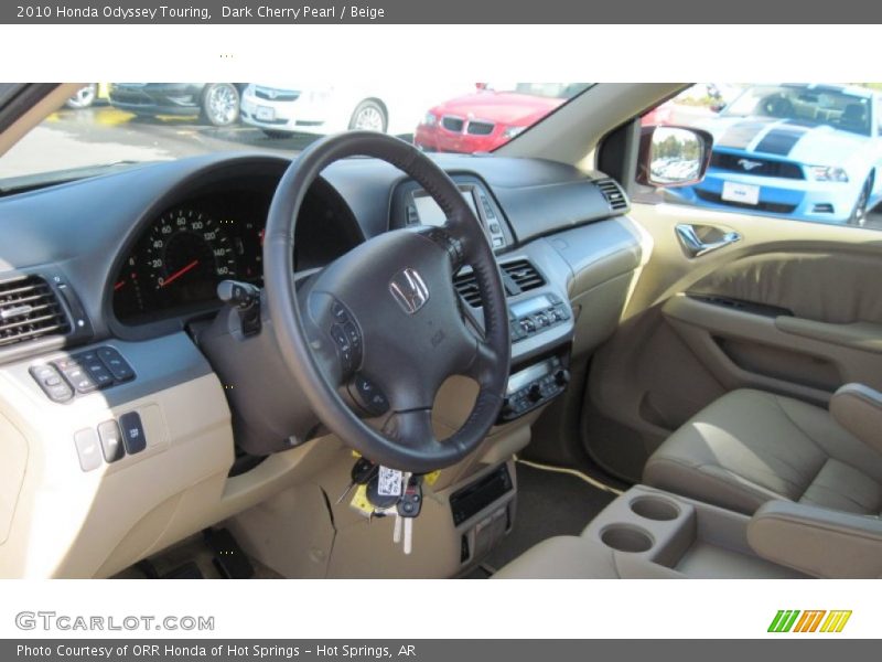 Dark Cherry Pearl / Beige 2010 Honda Odyssey Touring