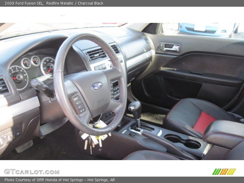 Redfire Metallic / Charcoal Black 2009 Ford Fusion SEL
