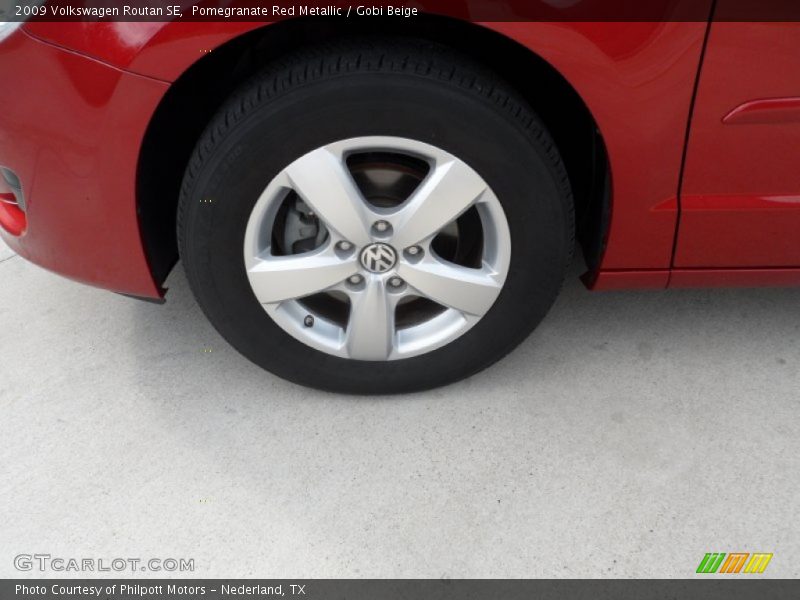 Pomegranate Red Metallic / Gobi Beige 2009 Volkswagen Routan SE