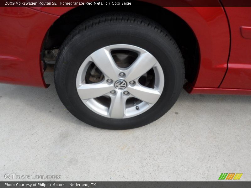 Pomegranate Red Metallic / Gobi Beige 2009 Volkswagen Routan SE