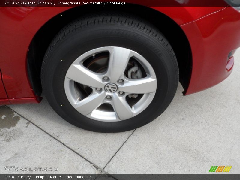 Pomegranate Red Metallic / Gobi Beige 2009 Volkswagen Routan SE