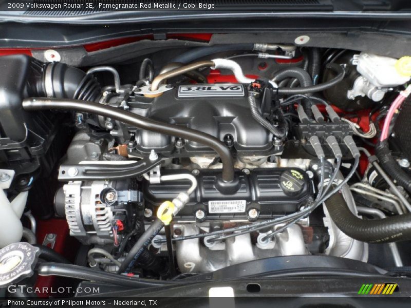 Pomegranate Red Metallic / Gobi Beige 2009 Volkswagen Routan SE