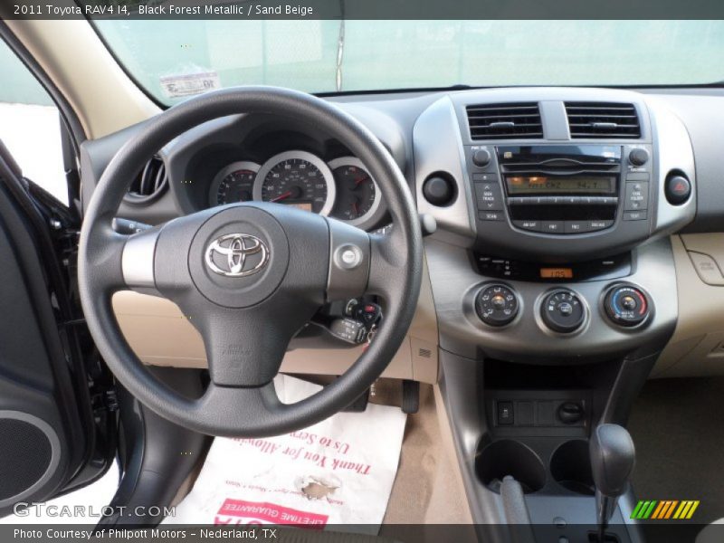 Black Forest Metallic / Sand Beige 2011 Toyota RAV4 I4
