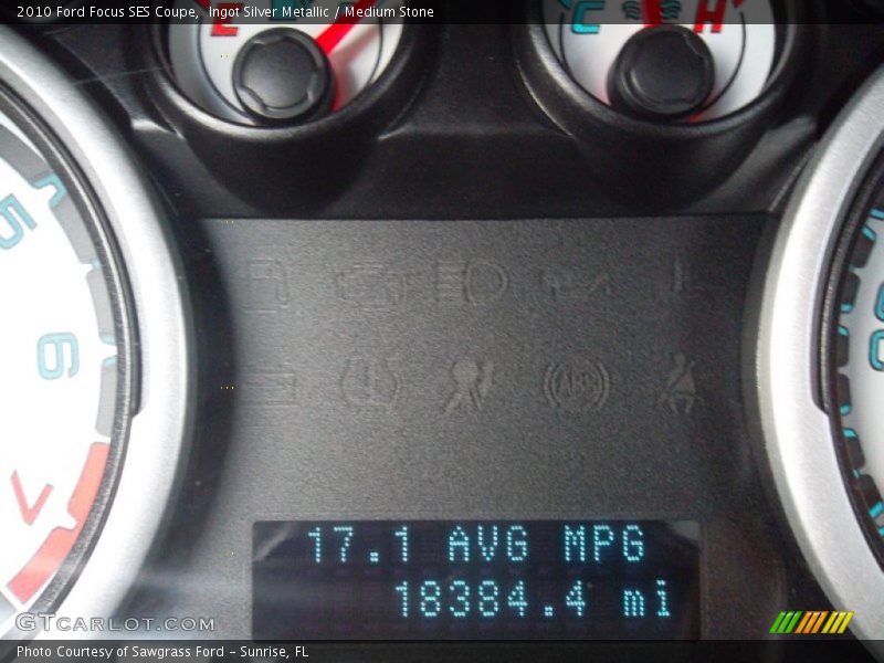 Ingot Silver Metallic / Medium Stone 2010 Ford Focus SES Coupe