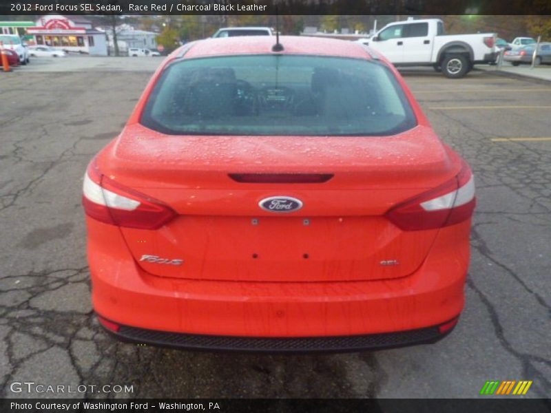 Race Red / Charcoal Black Leather 2012 Ford Focus SEL Sedan