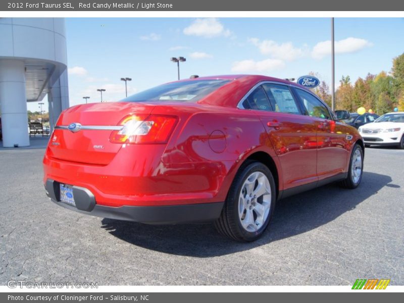 Red Candy Metallic / Light Stone 2012 Ford Taurus SEL