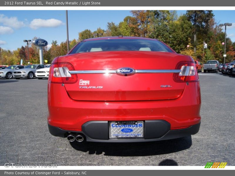 Red Candy Metallic / Light Stone 2012 Ford Taurus SEL