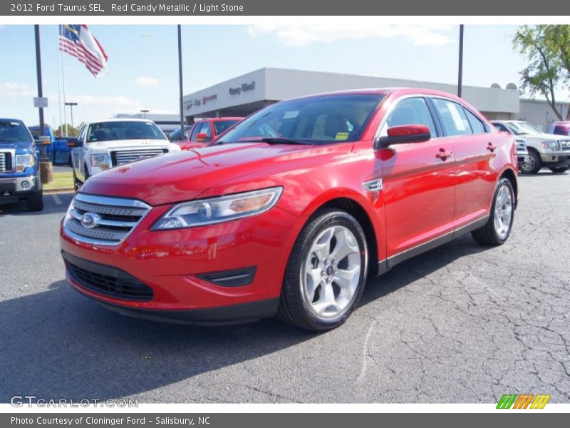 Red Candy Metallic / Light Stone 2012 Ford Taurus SEL