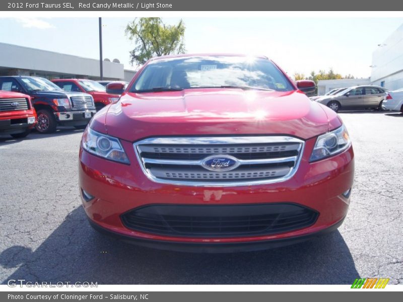 Red Candy Metallic / Light Stone 2012 Ford Taurus SEL