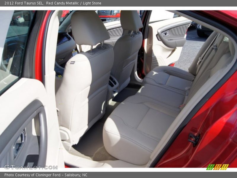 Red Candy Metallic / Light Stone 2012 Ford Taurus SEL