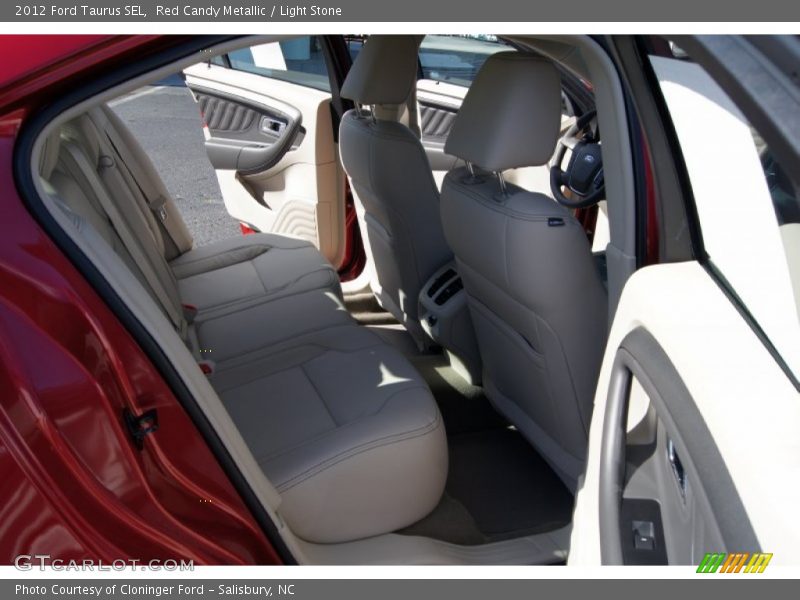Red Candy Metallic / Light Stone 2012 Ford Taurus SEL