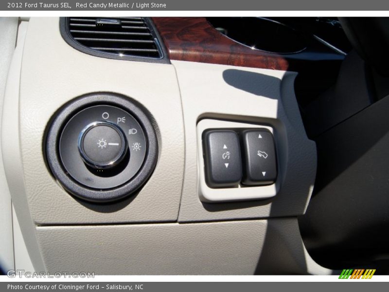 Red Candy Metallic / Light Stone 2012 Ford Taurus SEL