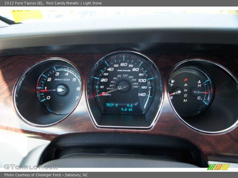 Red Candy Metallic / Light Stone 2012 Ford Taurus SEL
