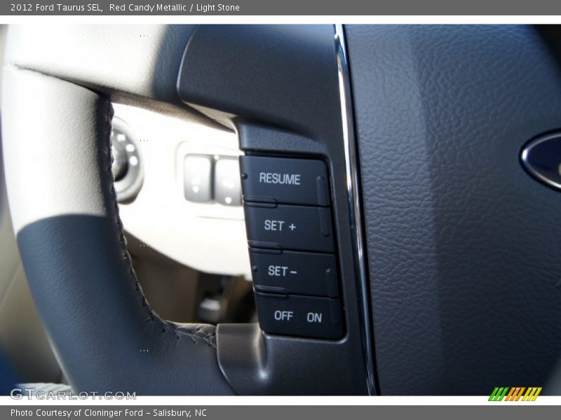 Red Candy Metallic / Light Stone 2012 Ford Taurus SEL