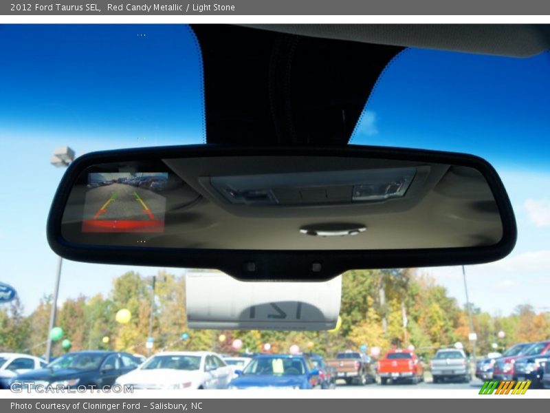 Red Candy Metallic / Light Stone 2012 Ford Taurus SEL