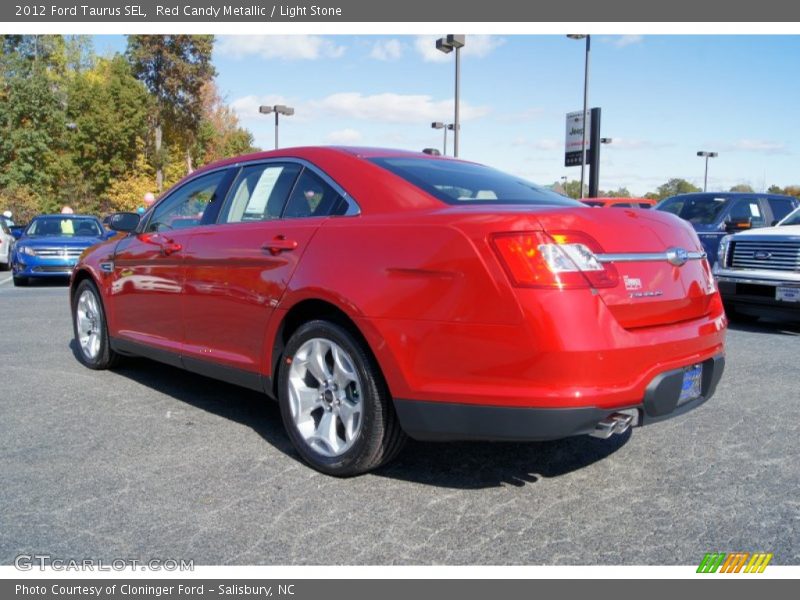 Red Candy Metallic / Light Stone 2012 Ford Taurus SEL