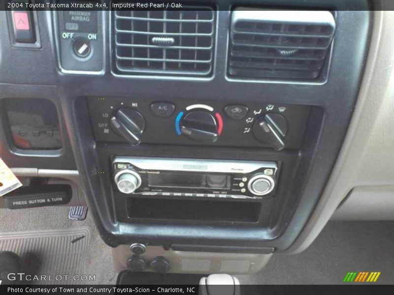 Impulse Red Pearl / Oak 2004 Toyota Tacoma Xtracab 4x4