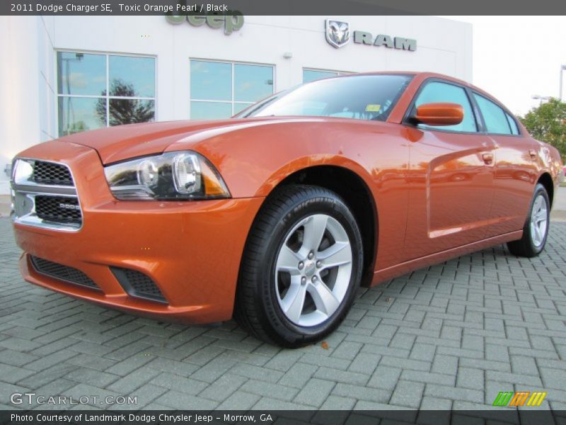 Toxic Orange Pearl / Black 2011 Dodge Charger SE