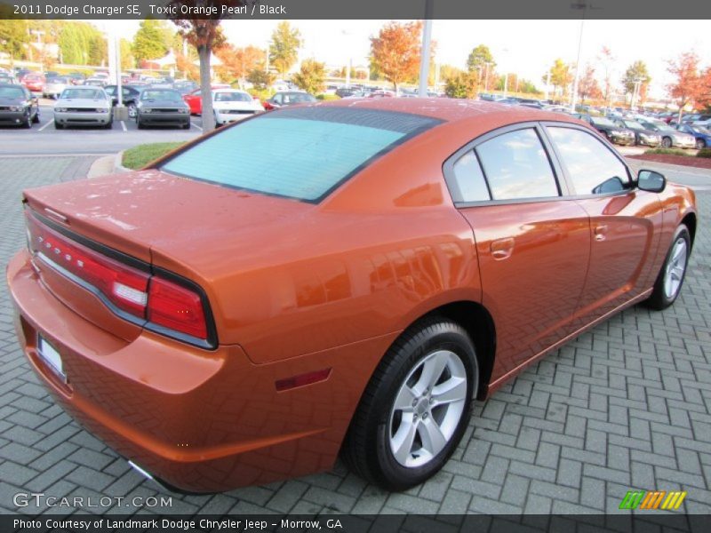 Toxic Orange Pearl / Black 2011 Dodge Charger SE