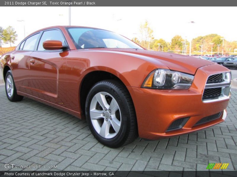 Toxic Orange Pearl / Black 2011 Dodge Charger SE