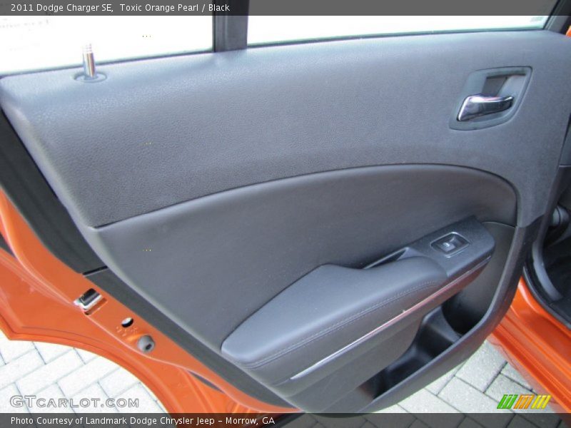 Toxic Orange Pearl / Black 2011 Dodge Charger SE
