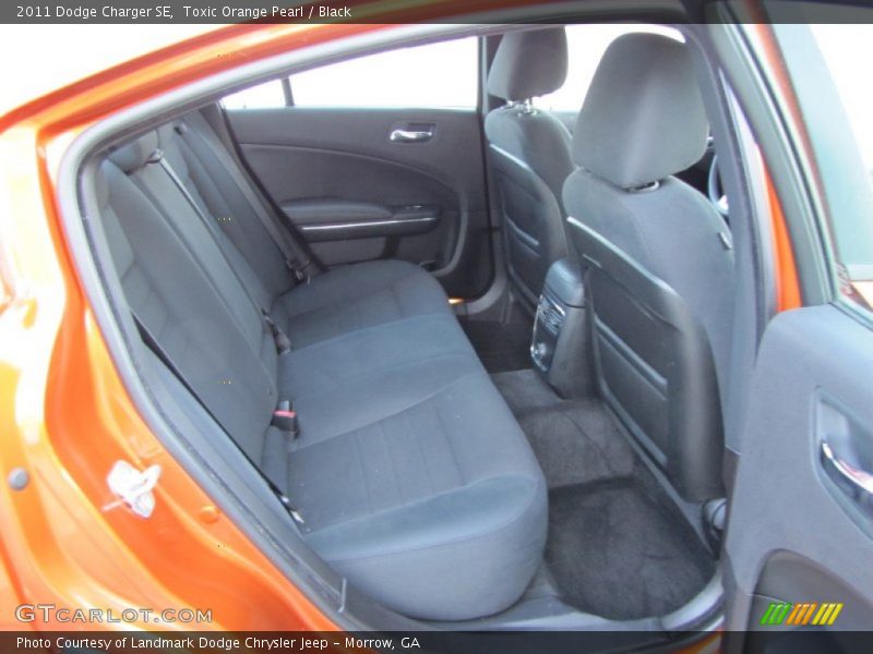 Toxic Orange Pearl / Black 2011 Dodge Charger SE