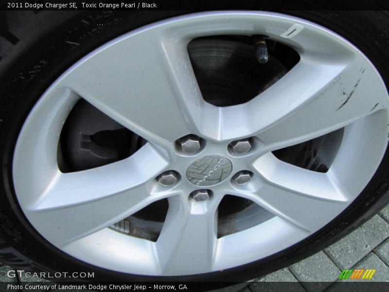 Toxic Orange Pearl / Black 2011 Dodge Charger SE