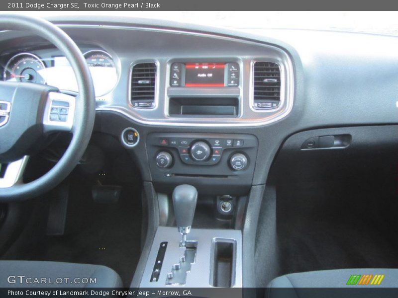 Toxic Orange Pearl / Black 2011 Dodge Charger SE