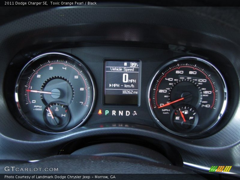 Toxic Orange Pearl / Black 2011 Dodge Charger SE