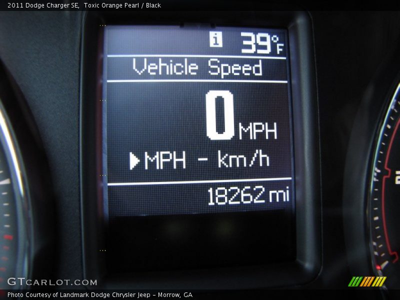 Toxic Orange Pearl / Black 2011 Dodge Charger SE