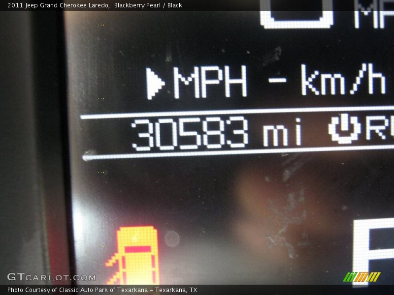 Blackberry Pearl / Black 2011 Jeep Grand Cherokee Laredo