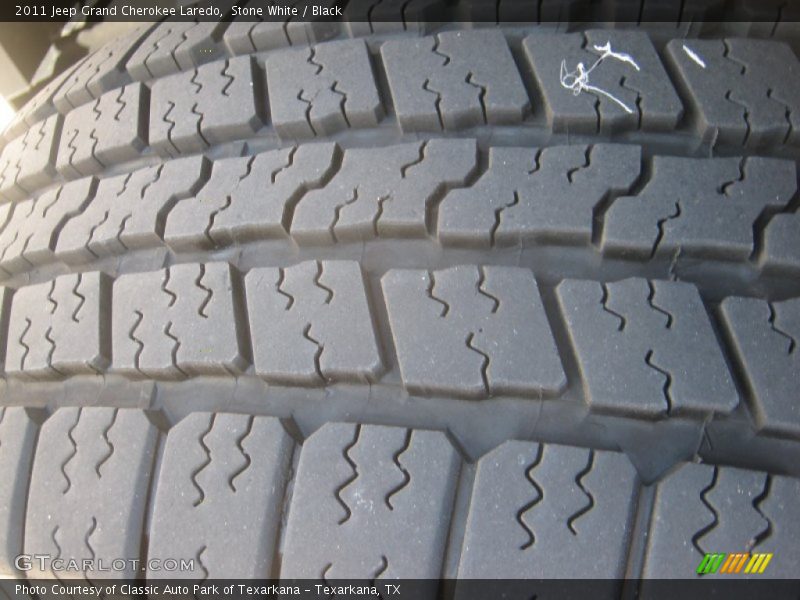 Stone White / Black 2011 Jeep Grand Cherokee Laredo