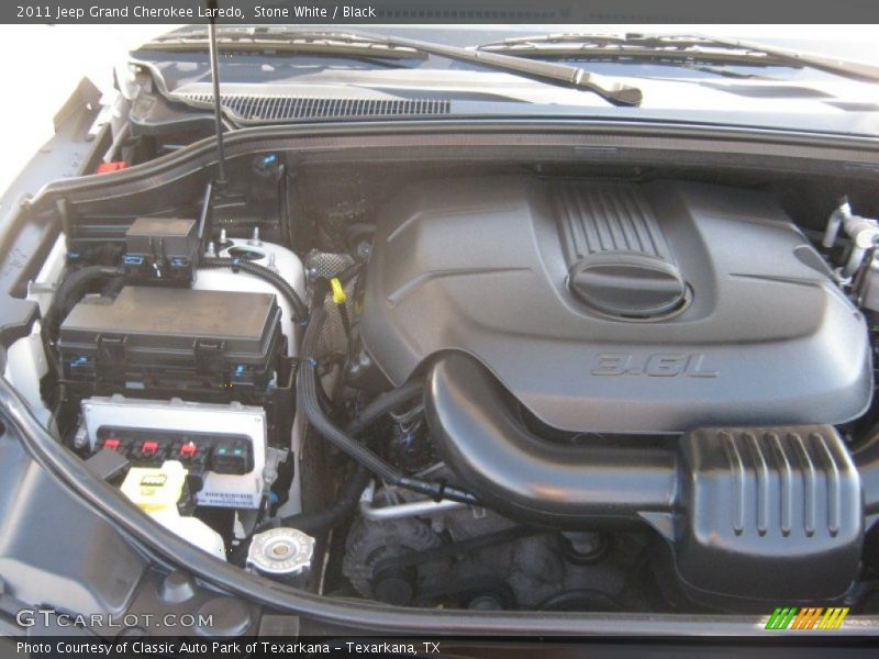 Stone White / Black 2011 Jeep Grand Cherokee Laredo