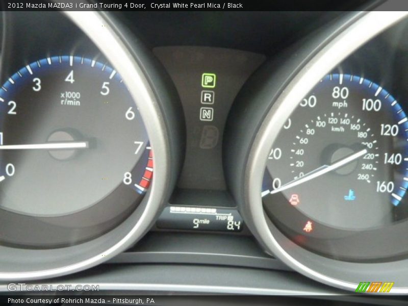 Crystal White Pearl Mica / Black 2012 Mazda MAZDA3 i Grand Touring 4 Door