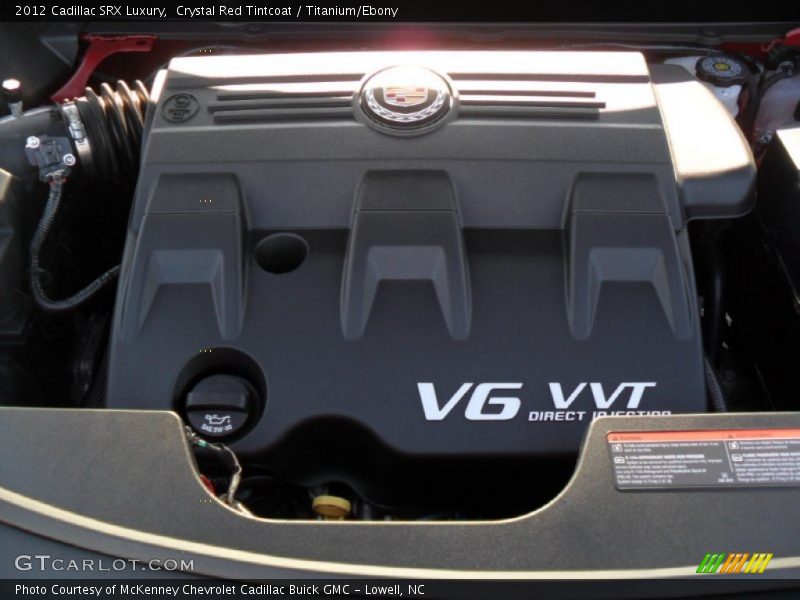 Crystal Red Tintcoat / Titanium/Ebony 2012 Cadillac SRX Luxury