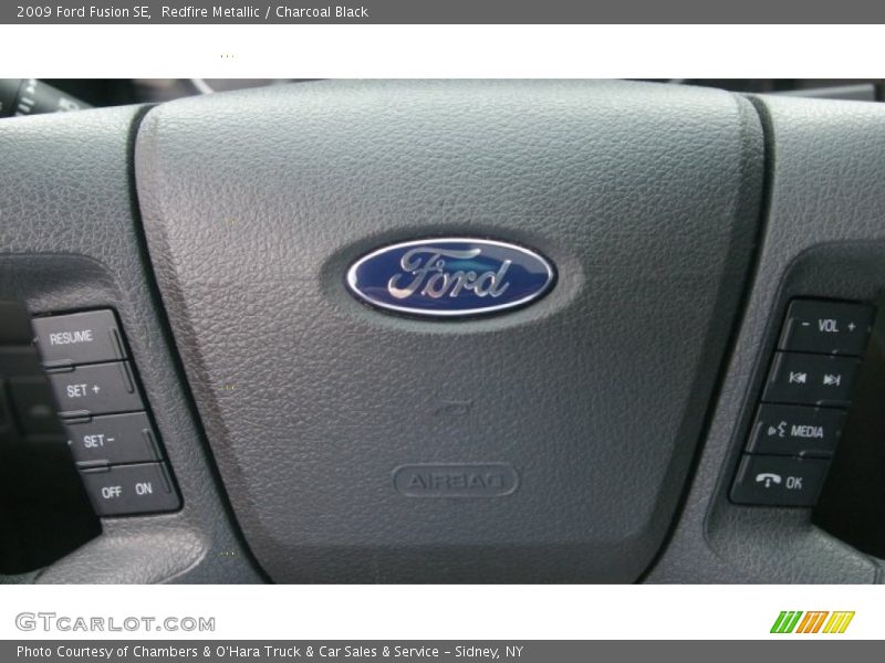 Redfire Metallic / Charcoal Black 2009 Ford Fusion SE
