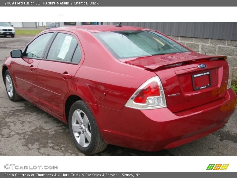 Redfire Metallic / Charcoal Black 2009 Ford Fusion SE