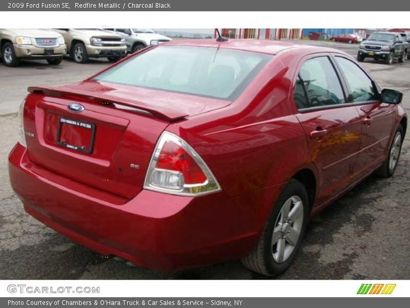 Redfire Metallic / Charcoal Black 2009 Ford Fusion SE