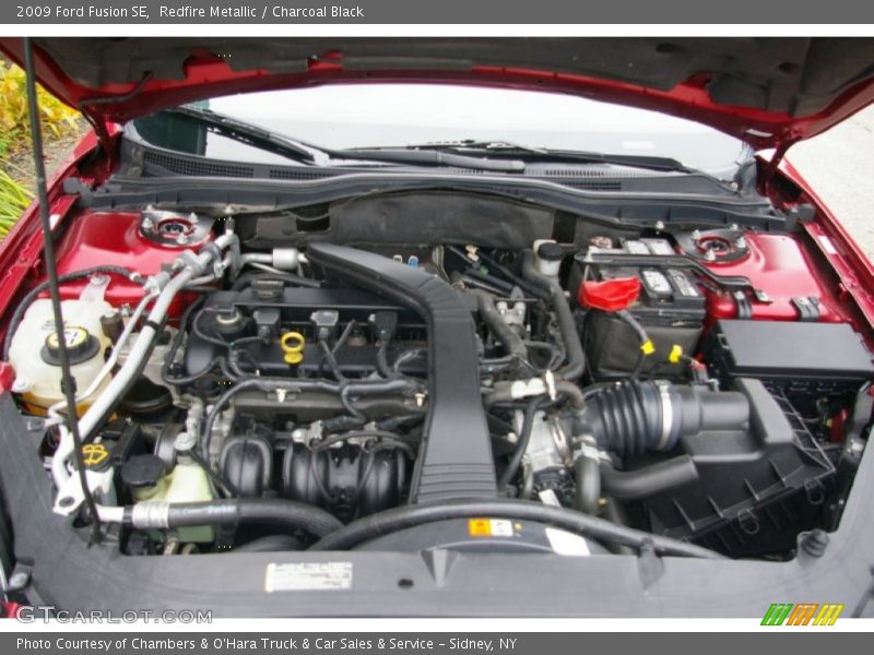 Redfire Metallic / Charcoal Black 2009 Ford Fusion SE