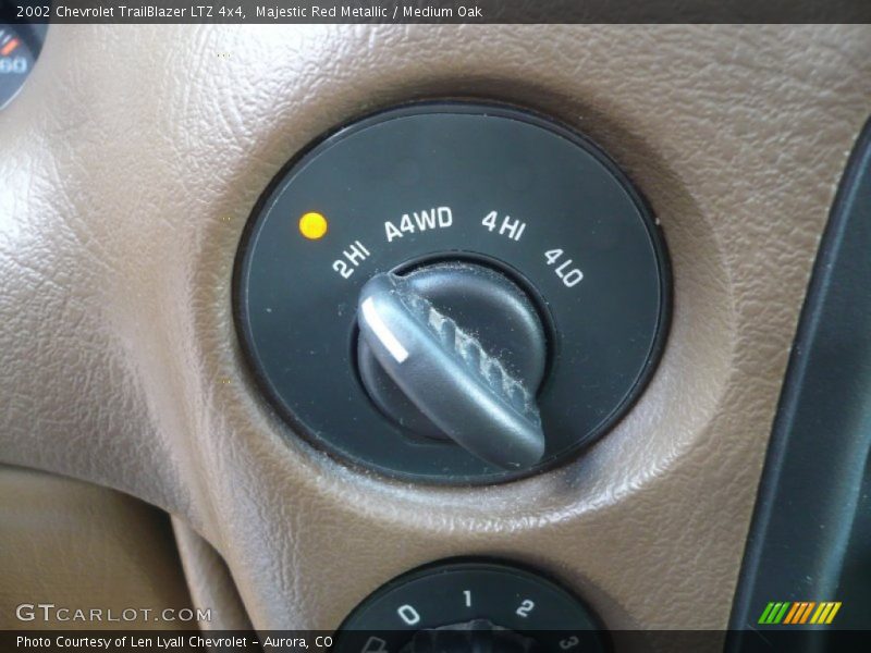 Majestic Red Metallic / Medium Oak 2002 Chevrolet TrailBlazer LTZ 4x4