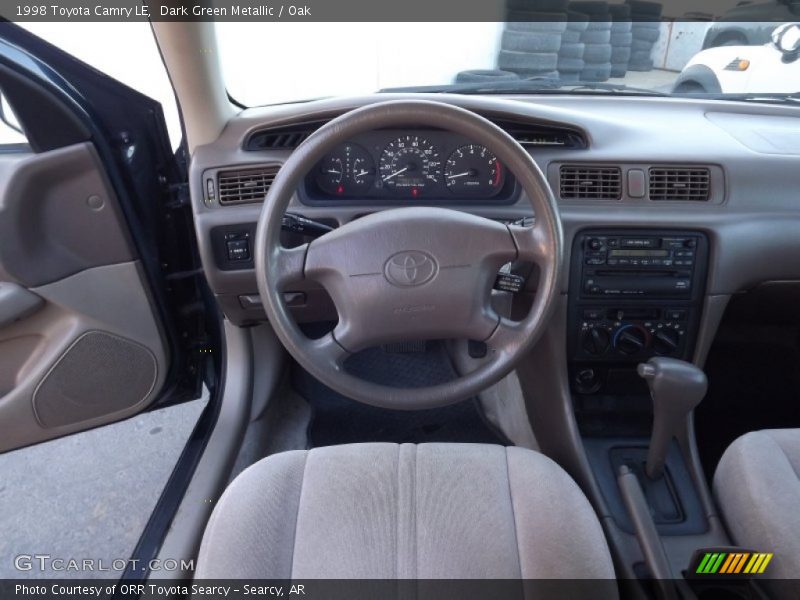 Dark Green Metallic / Oak 1998 Toyota Camry LE