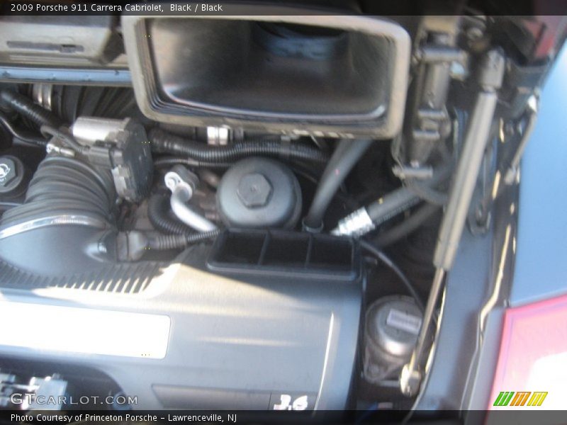 Black / Black 2009 Porsche 911 Carrera Cabriolet