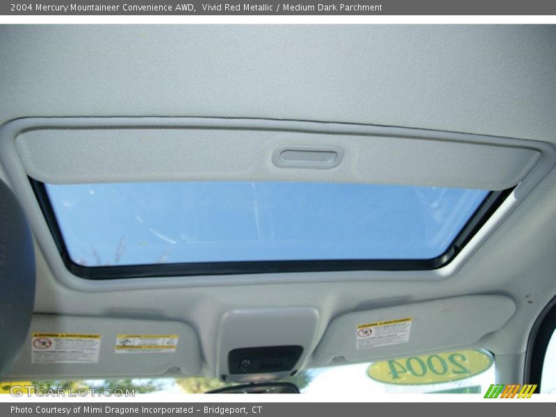 Vivid Red Metallic / Medium Dark Parchment 2004 Mercury Mountaineer Convenience AWD