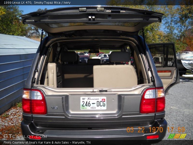 Smoky Topaz Mica / Ivory 1999 Lexus LX 470