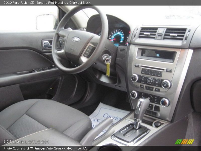 Sangria Red Metallic / Charcoal Black 2010 Ford Fusion SE
