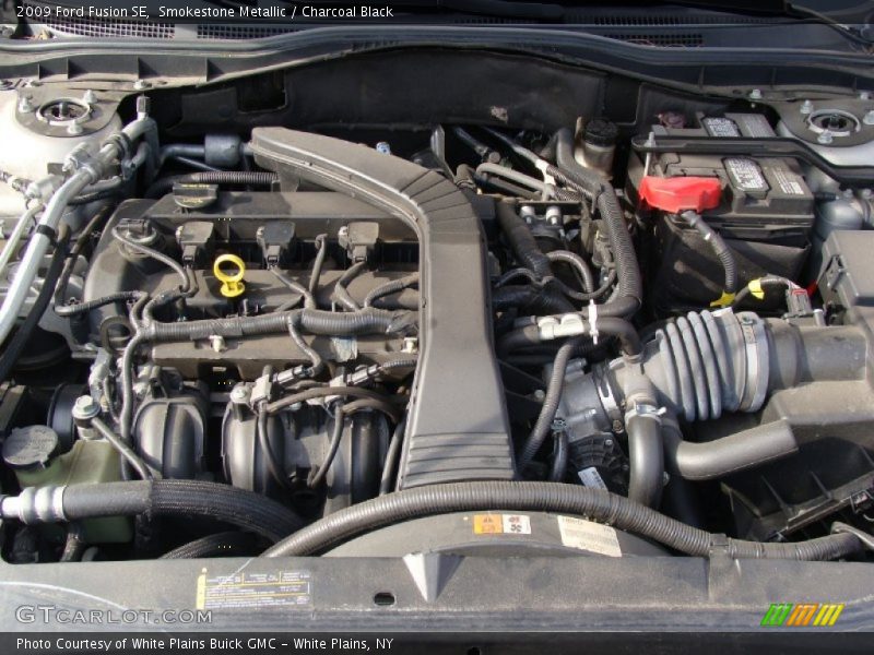 Smokestone Metallic / Charcoal Black 2009 Ford Fusion SE