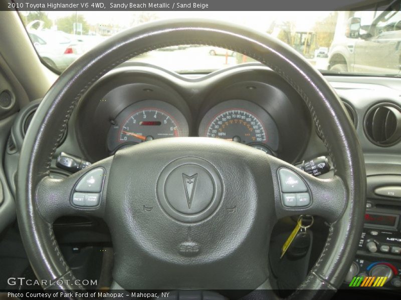 Sandy Beach Metallic / Sand Beige 2010 Toyota Highlander V6 4WD
